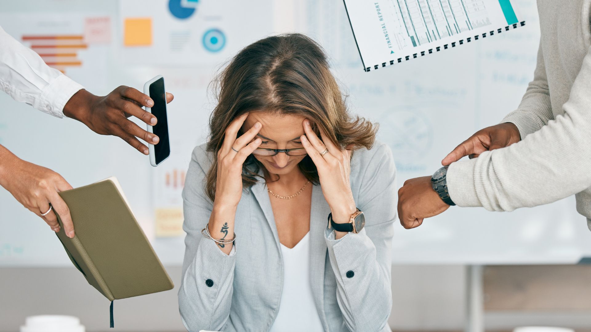 verwhelmed woman with a headache due to managing multiple tools. Zooza reduces costs for course owners by consolidating tools into one platform